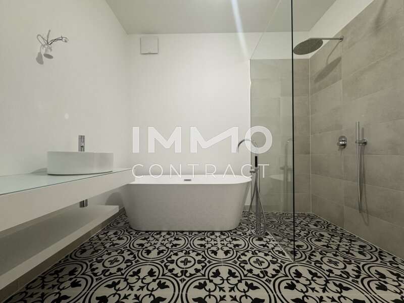 Bad mit Dusche und Wanne - Bild 7 von 15 Eigentumswohnung in 1130 - 7