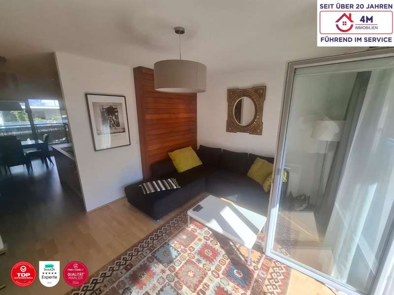 Wohnzimmer - Bild 1 von 7 Eigentumswohnung in 1110 - 1