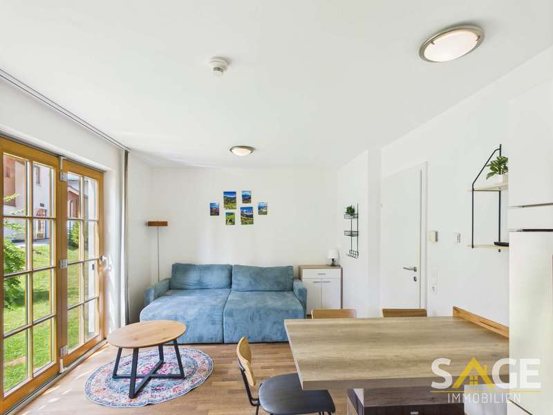Wohnzimmer - Bild 1 von 4 Eigentumswohnung in 5661 - 1